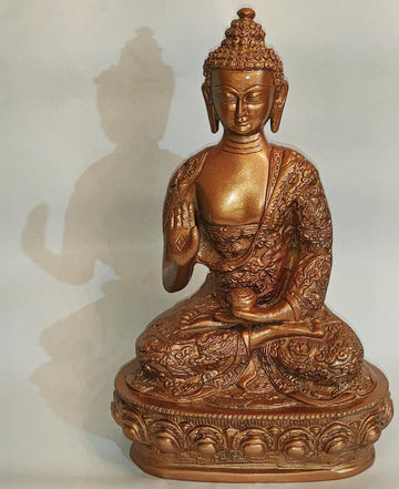 Brass Lord Buddha idol, seated with robe details and raised right hand