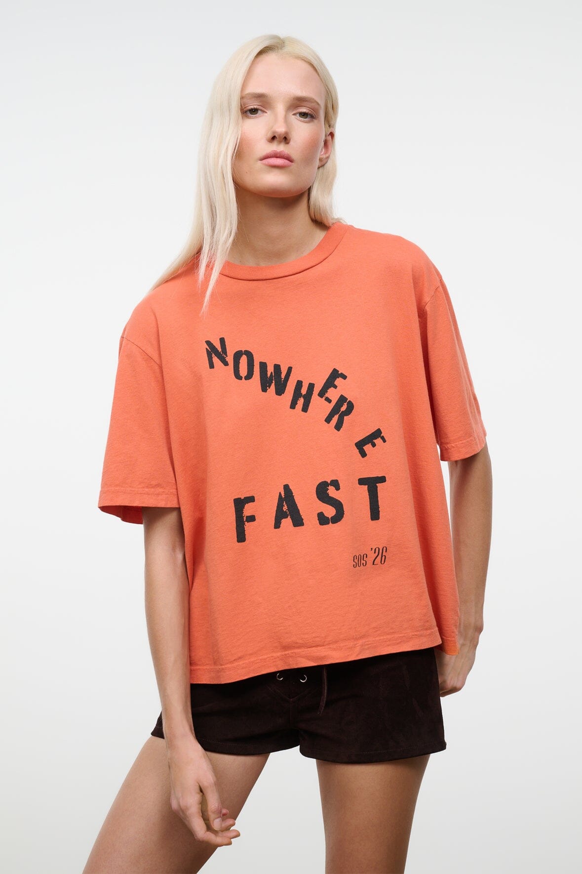 Orange relaxed crew-neck T-shirt with 'NOWHERE FAST' front graphic print