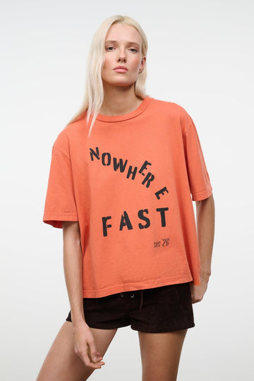 Orange relaxed crew-neck T-shirt with 'NOWHERE FAST' front graphic print