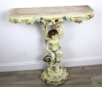 Entratina in legno con putto