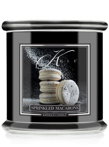 Kringle Candle with 'Sprinkled Macarons' design on a black background